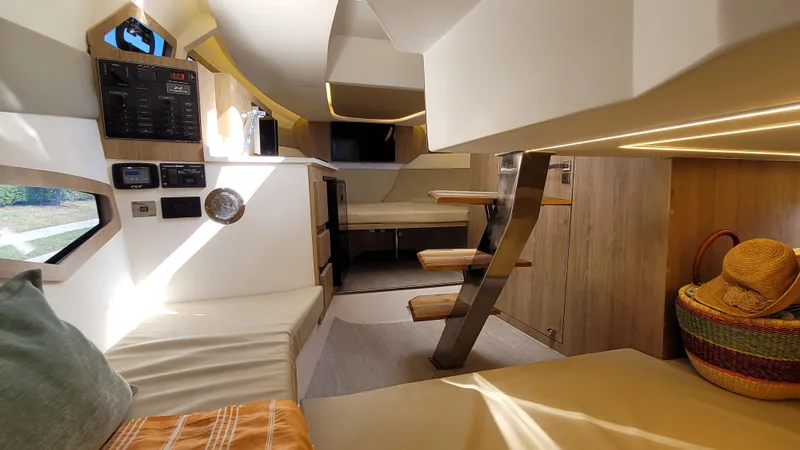 Slide: The Image of Interior of 2023 NX Boats NX340, featuring modern design and comfortable seating. - 23