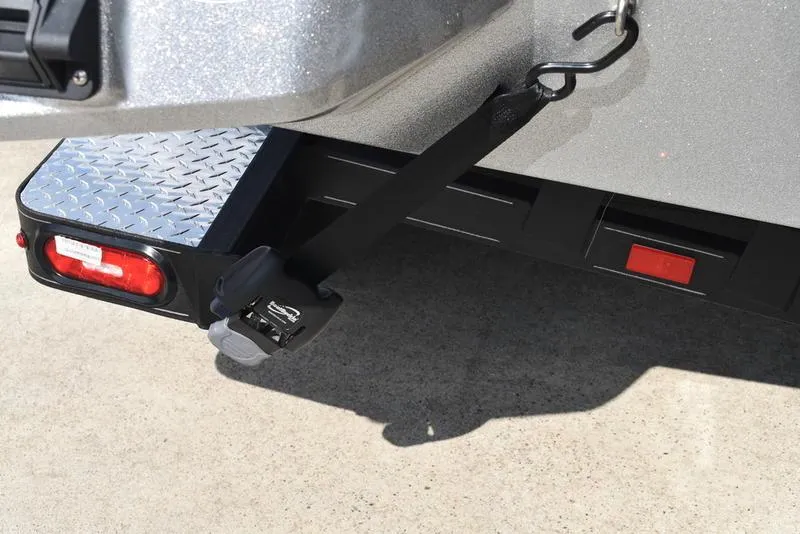 Slide: The Image of 2025 Triton 21XP Patriot boat dashboard with dual Lowrance fish finders. - 12