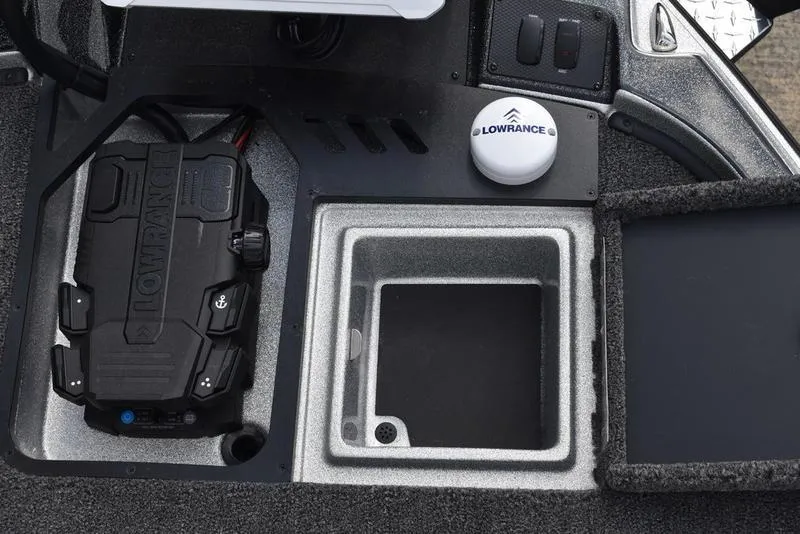 Slide: The Image of Control panel of 2025 Triton 21XP Patriot boat featuring Lowrance electronics. - 14