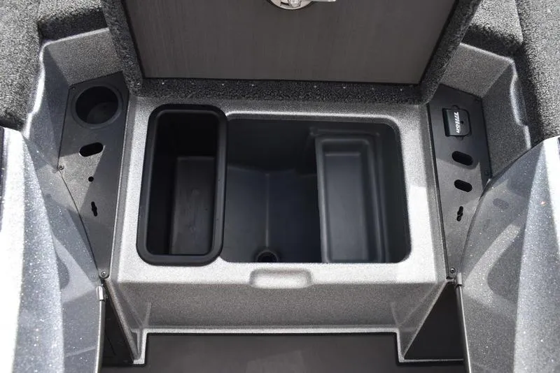 Slide: The Image of Storage compartment of 2025 Triton 21XP Patriot boat, featuring multiple sections. - 24