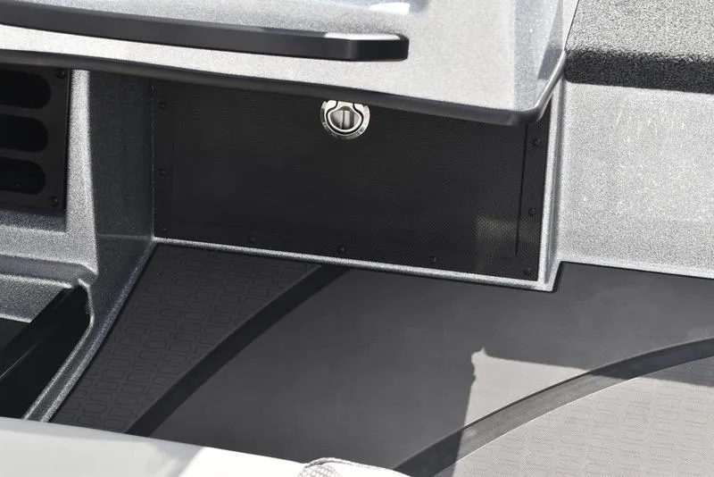 Slide: The Image of 2025 Triton 21XP Patriot boat interior storage compartment detail. - 27