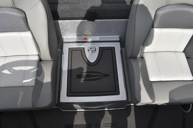 Slide: The Image of Interior of 2025 Triton 21XP Patriot boat with gray and white seating. - 32