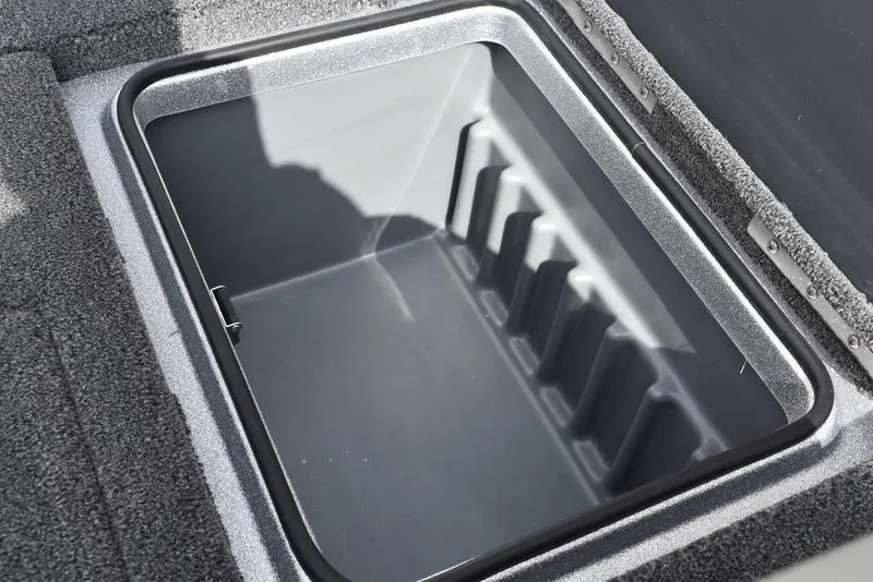 Slide: The Image of Storage compartment of 2025 Triton 21XP Patriot boat, featuring a sleek, durable design. - 36