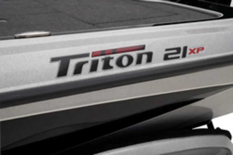 Slide: The Image of 2025 Triton 21XP Patriot boat trailer with diamond plate steps and spare tire. - 5