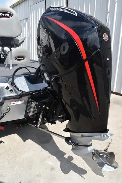 Slide: The Image of 2025 Triton 21XP Patriot boat engine mount detail. - 9