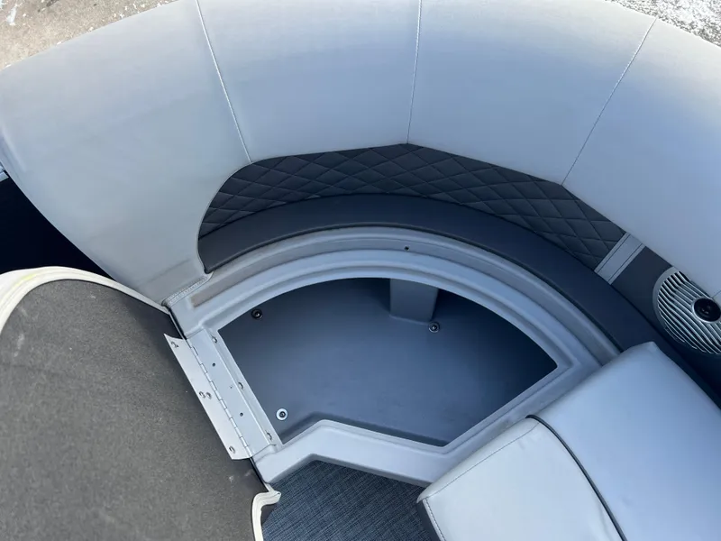 Slide: The Image of 2021 Bennington L 21 Swingback boat interior seating with storage compartment. - 10