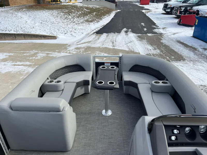 Slide: The Image of 2021 Bennington L 21 Swingback pontoon boat with gray seating and cup holders. - 18