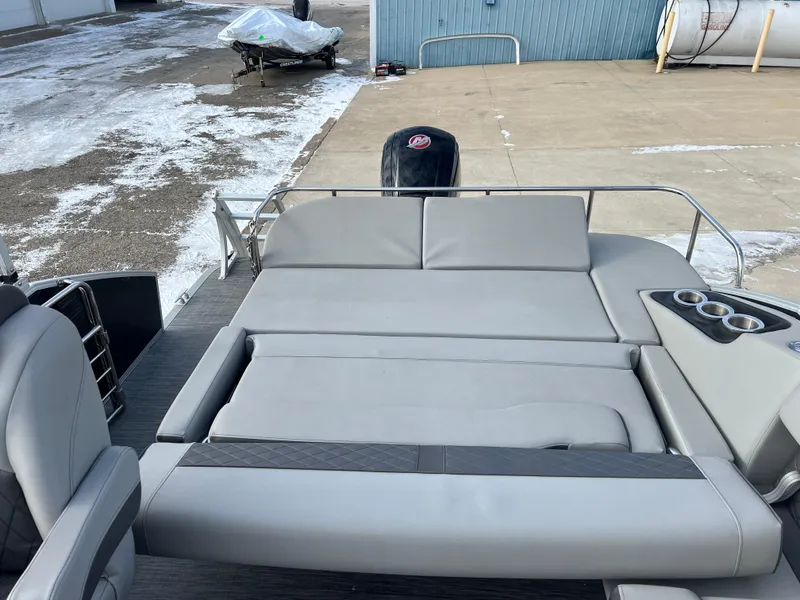 Slide: The Image of 2021 Bennington L 21 Swingback pontoon boat with spacious seating and cup holders. - 24
