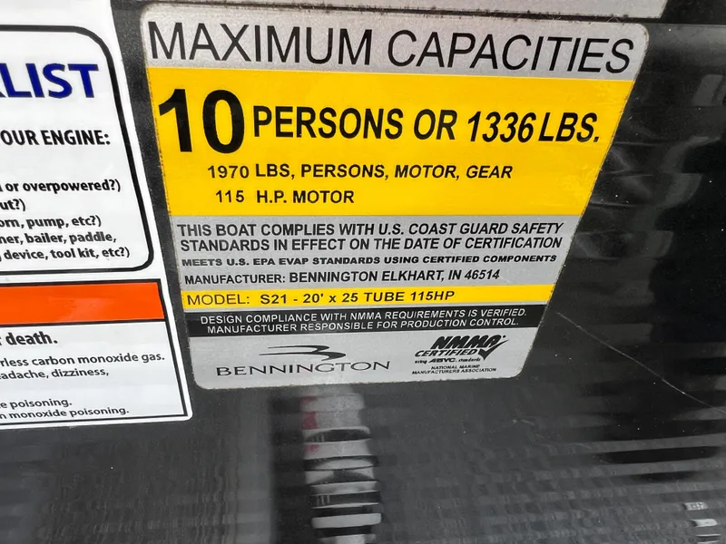Slide: The Image of Capacity label for 2021 Bennington L 21 Swingback, max 10 persons or 1336 lbs, 116 HP motor. - 26