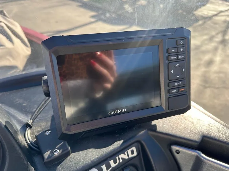 Slide: The Image of Garmin GPS device on 2015 Lund 1750 Rebel XS SS boat dashboard. - 21
