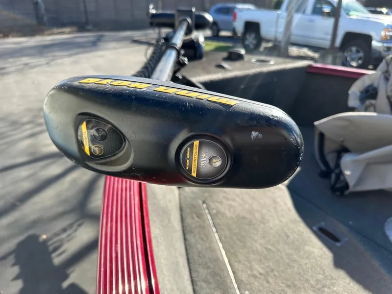 Slide: The Image of Close-up of a 2015 Lund 1750 Rebel XS SS boat's trolling motor on a sunny day. - 26