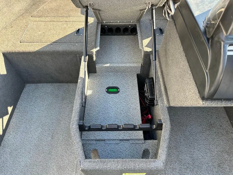 Slide: The Image of 2015 Lund 1750 Rebel XS SS boat interior storage compartment. - 27