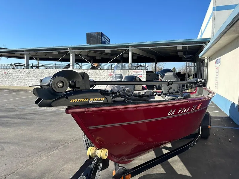 Slide: The Image of 2015 Lund 1750 Rebel XS SS boat with Minn Kota trolling motor. - 4