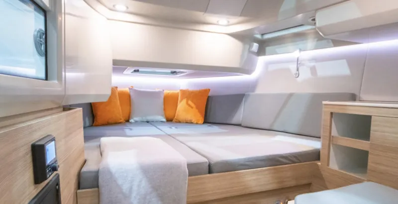 Slide: The Image of 2024 Saxdor 270 GTO cabin interior with modern design and cozy seating. - 10