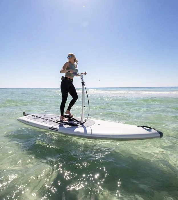 Slide: The Image of Woman enjoying Hobie Mirage Eclipse Ace 2025 on clear ocean water. - 2