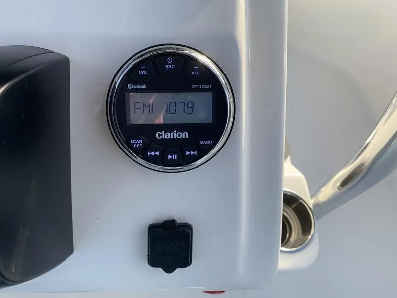 Slide: The Image of Clarion radio display on Bulls Bay 2200 XS boat, tuned to FM 107.9, 2025 model. - 18