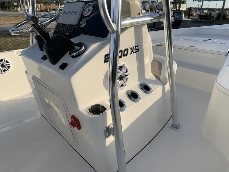 Slide: The Image of 2025 Bulls Bay 2200 XS boat console with Garmin system and cup holders. - 19