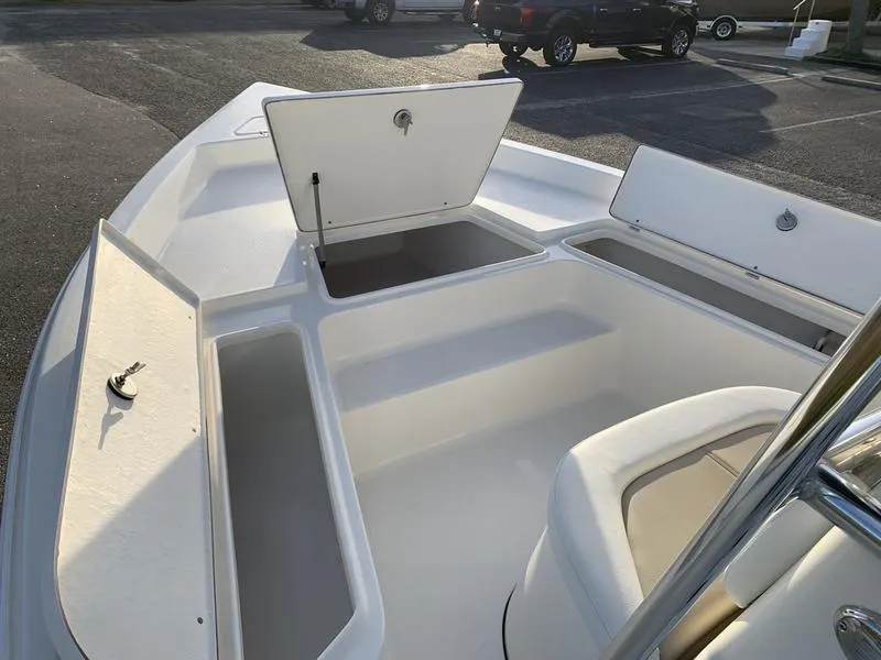 Slide: The Image of 2025 Bulls Bay 2200 XS boat interior with open storage compartments. - 22