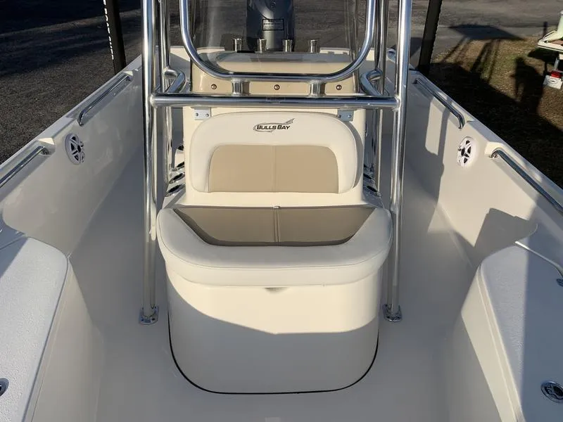 Slide: The Image of 2025 Bulls Bay 2200 XS boat interior with seating and stainless steel frame. - 24