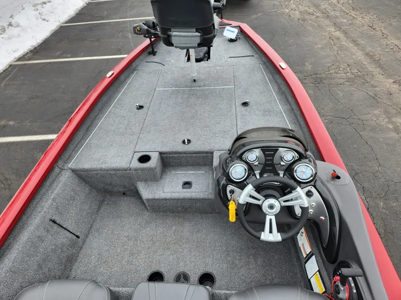 Slide: The Image of 2019 Tracker Pro Team 190 TX Tournament Edition boat interior with steering console. - 10