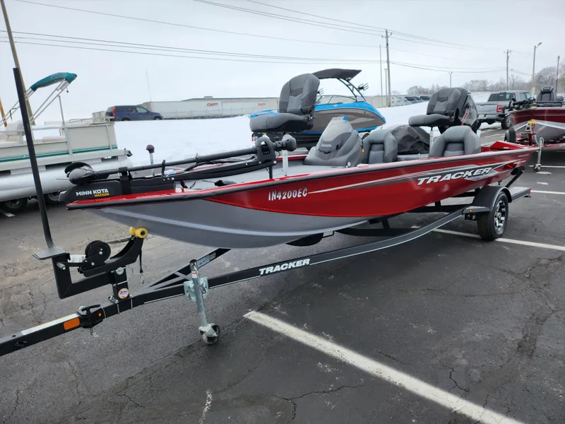 Slide: The Image of 2019 Tracker Pro Team 190 TX Tournament Edition boat on trailer in parking lot. - 6