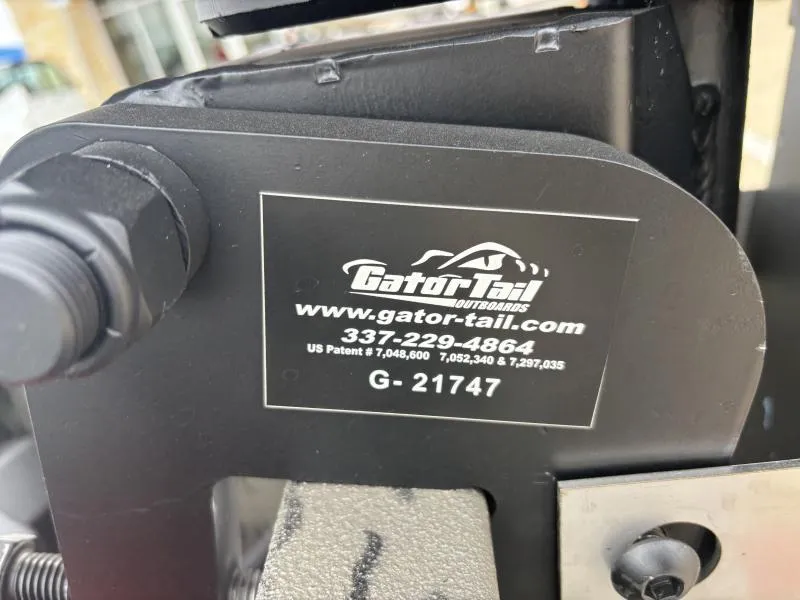 Slide: The Image of Close-up of Gator Tail Outboards label on War Eagle 750 Gladiator, 2025 model. - 10