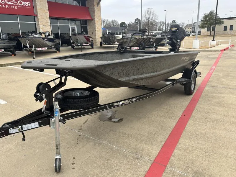 Slide: The Image of 2025 War Eagle 750 Gladiator boat on trailer at dealership. - 6