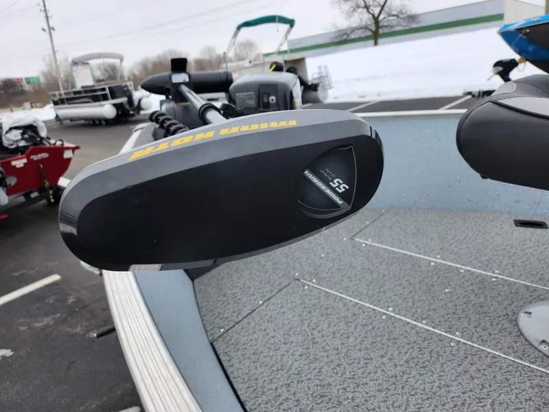 Slide: The Image of 2019 Lund 1600 Fury Tiller boat with trolling motor in a snowy parking lot. - 5