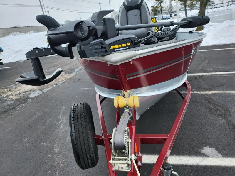 Slide: The Image of 2019 Lund 1600 Fury Tiller boat on trailer, equipped with Minn Kota motor. - 7