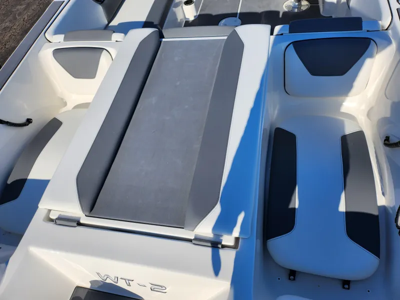 Slide: The Image of 2019 Heyday WT-2DC boat interior with gray and white seating. - 11