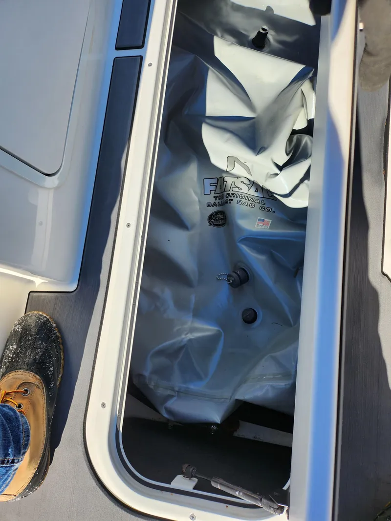 Slide: The Image of Storage compartment in a 2019 Heyday WT-2DC boat with ballast bag inside. - 16