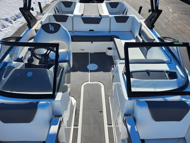 Slide: The Image of 2019 Heyday WT-2DC boat interior with seating and steering wheel. - 19