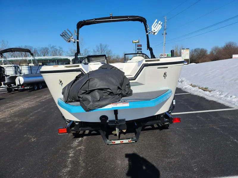 Slide: The Image of 2019 Heyday WT-2DC boat on trailer, parked on snowy pavement. - 2