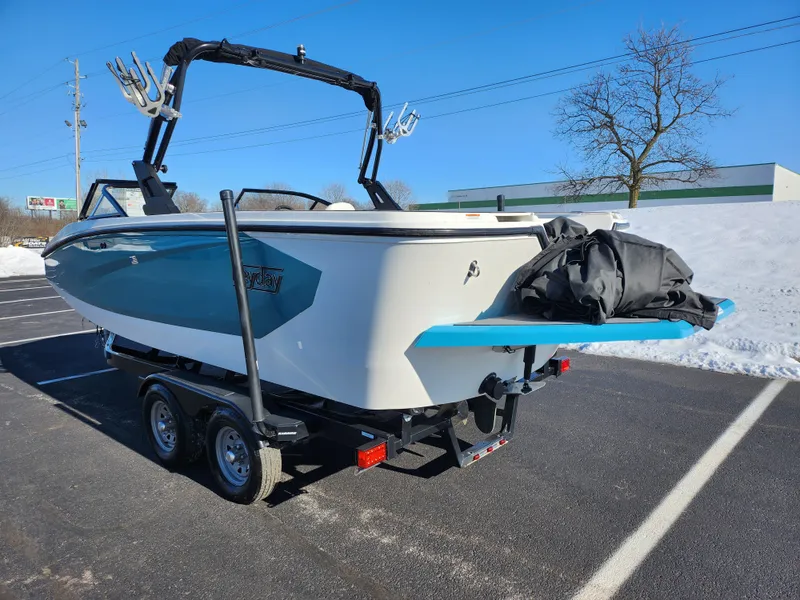 Slide: The Image of 2019 Heyday WT-2DC boat on trailer in sunny parking lot. - 3
