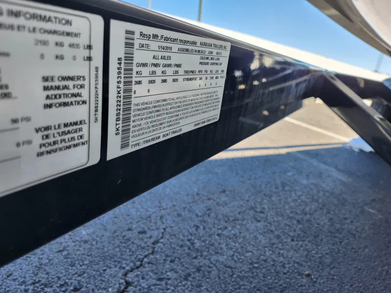 Slide: The Image of 2019 Heyday WT-2DC label on boat trailer, displaying weight and safety information. - 8
