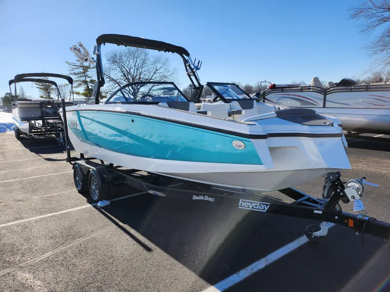 Slide: The Image of 2019 Heyday WT-2DC boat on trailer in parking lot, sunny day. - 9