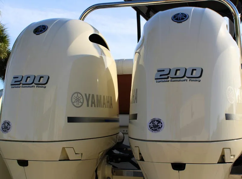 Slide: The Image of Twin Yamaha 200 outboard engines on a 2024 Capoforte FX270 boat. - 4