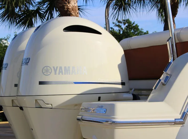 Slide: The Image of 2024 Capoforte FX270 boat with Yamaha engines, featuring sleek design and luxurious seating. - 5