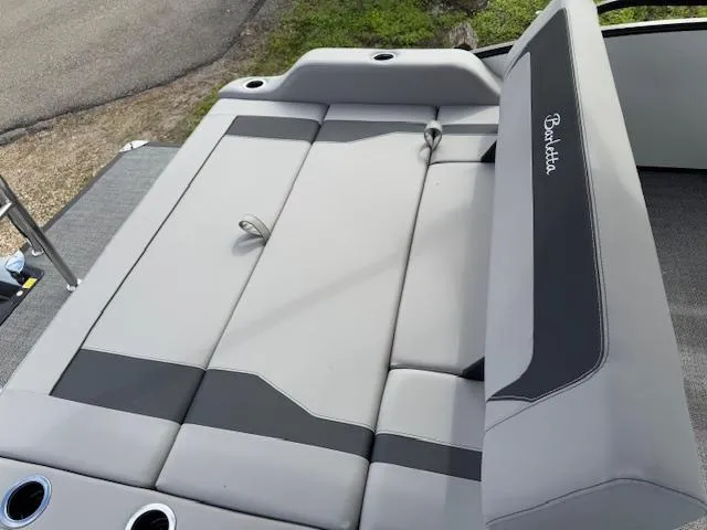 Slide: The Image of 2025 Barletta ARIA 22UC boat seating with gray and black upholstery. - 8