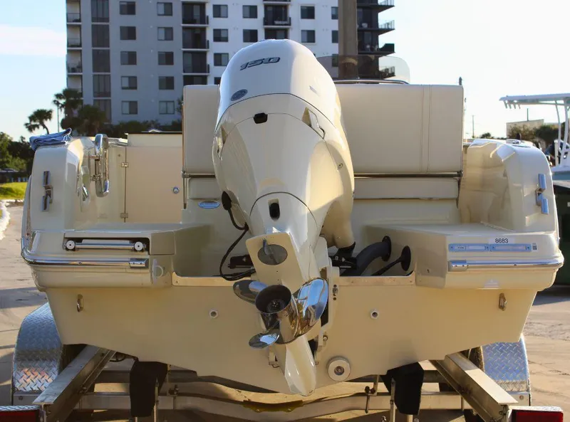 Slide: The Image of 2024 Capoforte SX200 boat on trailer, rear view with outboard motor. - 3