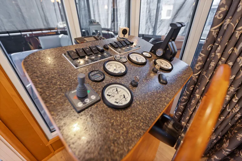 Slide: The Image of Control panel of 2011 Horizon 18 X 82 Houseboat with gauges and switches. - 14