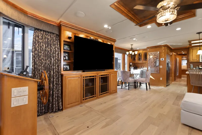 Slide: The Image of Luxurious interior of 2011 Horizon 18 X 82 houseboat with modern furnishings and wooden accents. - 16