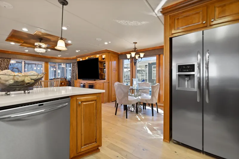 Slide: The Image of Luxurious 2011 Horizon 18 X 82 houseboat interior with modern kitchen and dining area. - 22