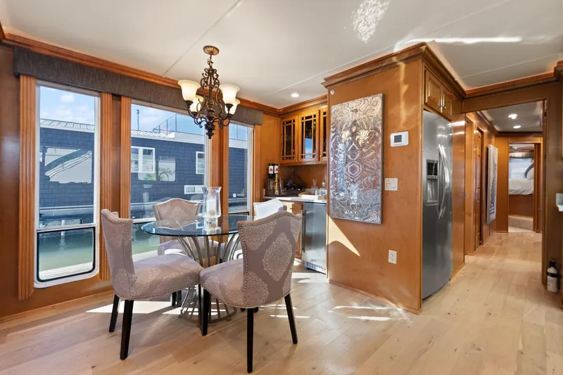 Slide: The Image of Luxurious interior of 2011 Horizon 18 X 82 Houseboat with elegant dining area and modern kitchen. - 23