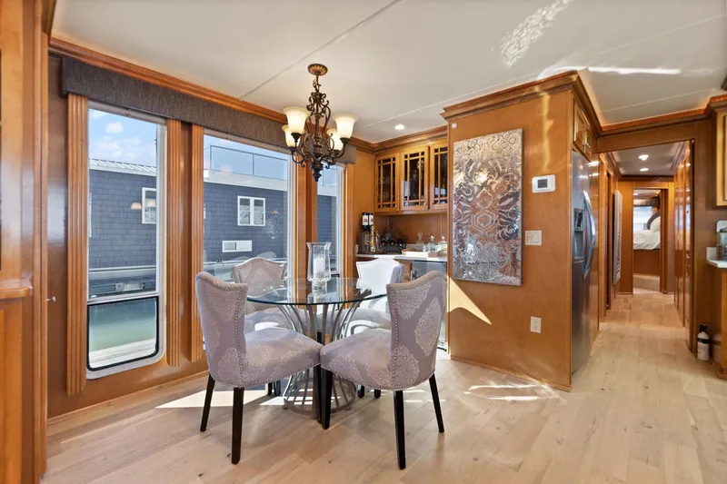 Slide: The Image of Luxurious interior of 2011 Horizon 18 X 82 houseboat with elegant dining area. - 24