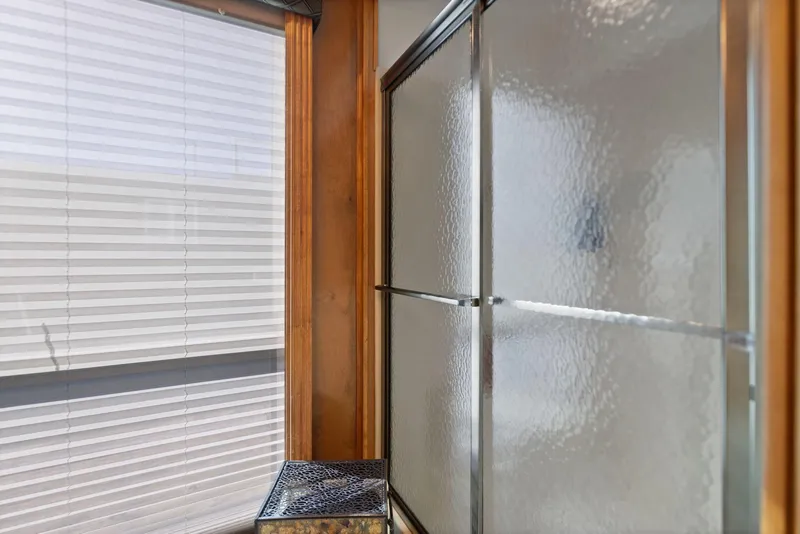 Slide: The Image of Frosted glass shower door in 2011 Horizon 18 X 82 Houseboat bathroom. - 31