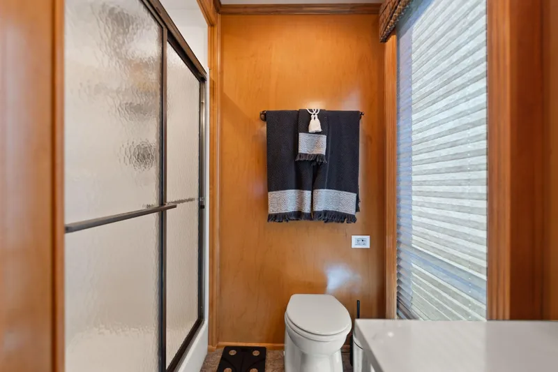 Slide: The Image of Bathroom interior of 2011 Horizon 18 X 82 Houseboat with shower and toilet. - 38