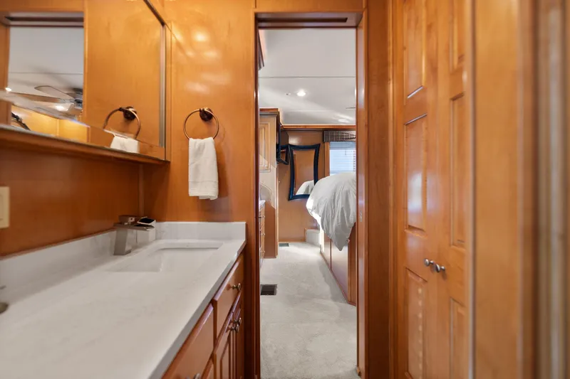 Slide: The Image of Interior of 2011 Horizon 18 X 82 Houseboat with wooden cabinetry and bedroom view. - 39
