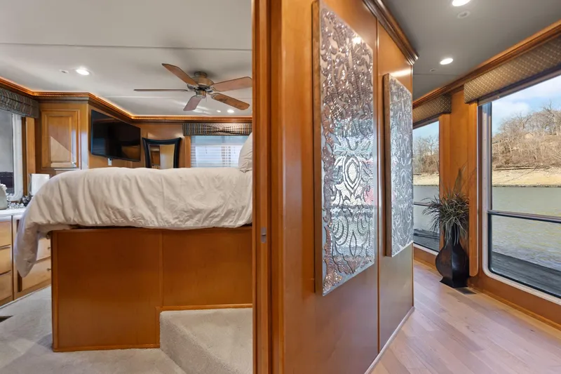 Slide: The Image of Luxurious 2011 Horizon 18 X 82 houseboat interior with elegant bedroom and scenic river view. - 41