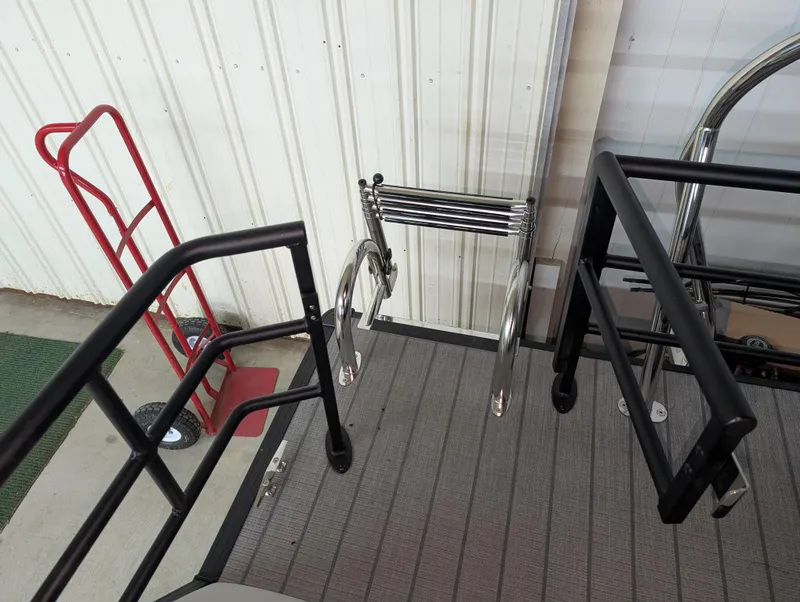 Slide: The Image of Boat deck with metal railings and ladder, Sylvan Mirage 8522 CLZ, 2025 model. - 12